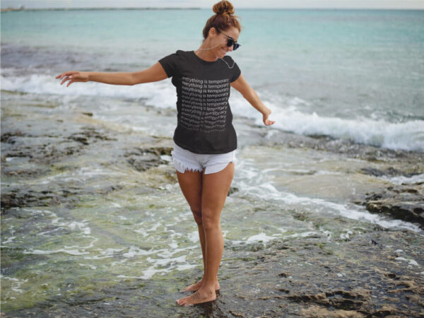 AwakeNAware.com-Awake-&-Aware-Woman-on-Beach-Wearing-Evverything-is-Temporary-Black-Graphic-Tshirt