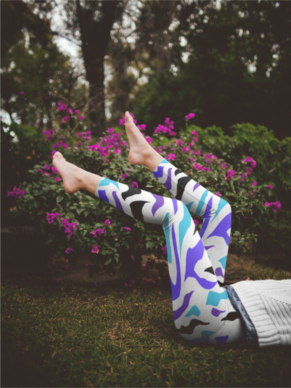 AwakeNAware.com-Awake-&-Aware-Woman-with-Legs-up-Wearing-Unicorn-Yoga-Leggings